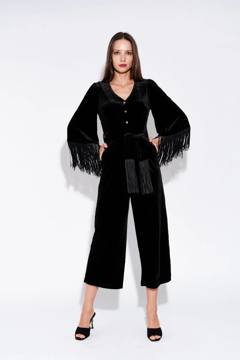 black velvet elvis jumpsuit with fringe sleeves