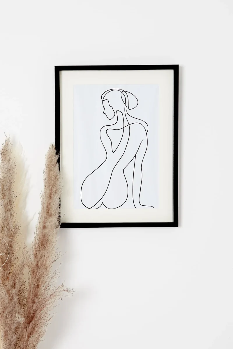 framed sitting woman wall art scaled