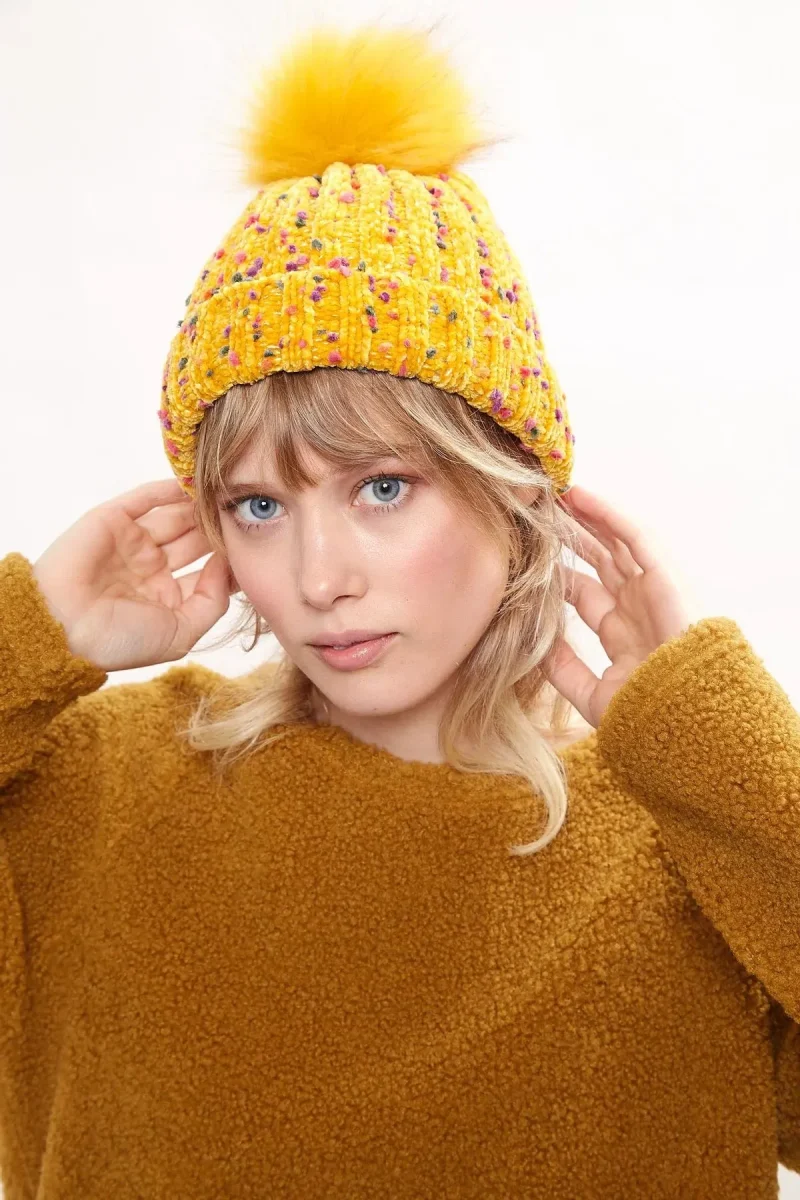 louche shannon mustard knit beanie with faux fur bobble