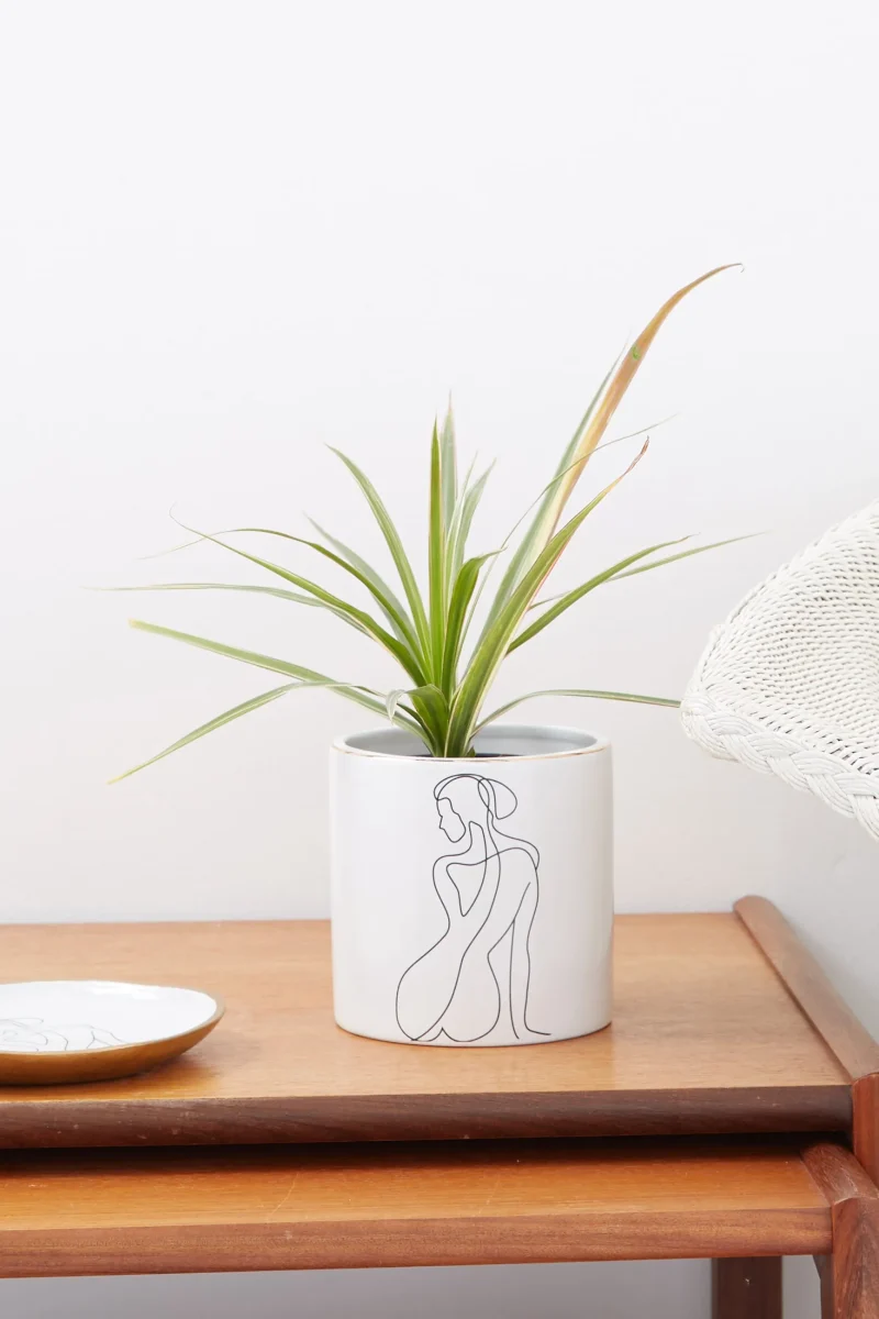 modern sitting woman planter for indoor decor scaled