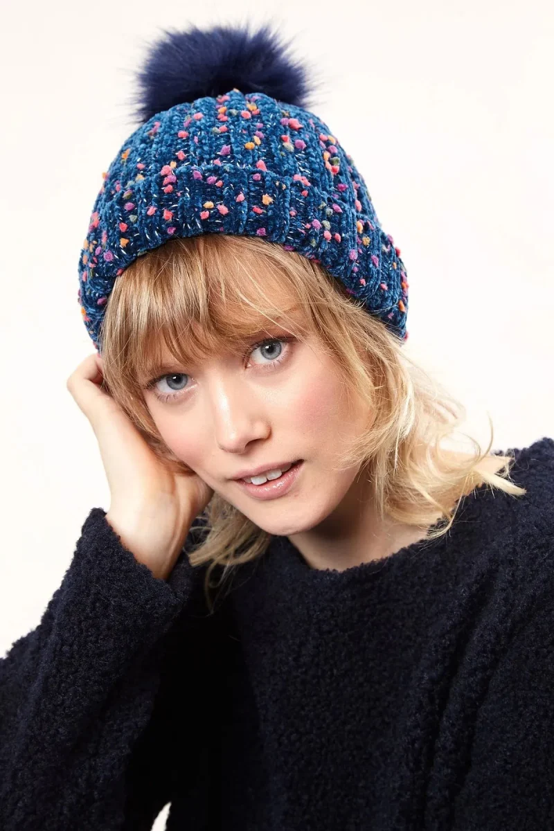 navy knitted nep beanie with faux fur bobble louche shannon