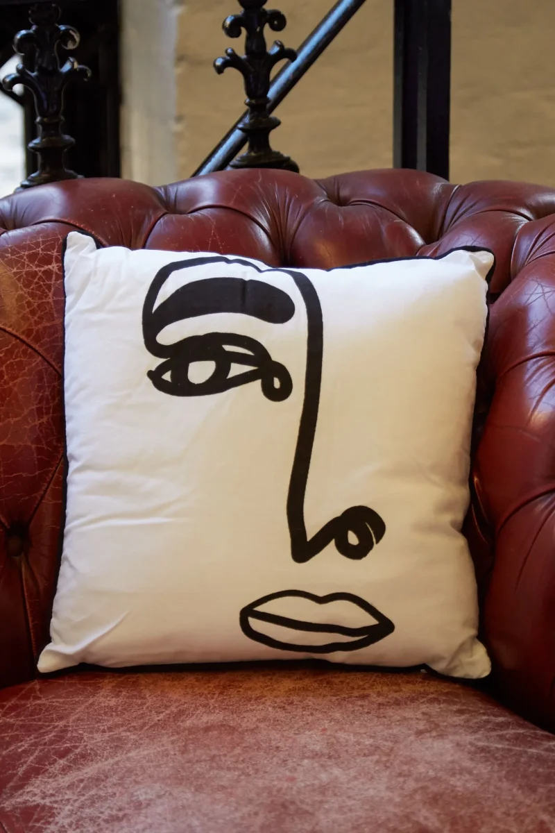 open eye face print throw pillow scaled